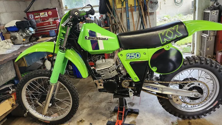 Fully restored vintage Kawasaki KX250 two-stroke dirt bike